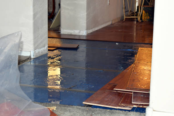 Professional Flood Damage Repair technician working in Buxton, ME